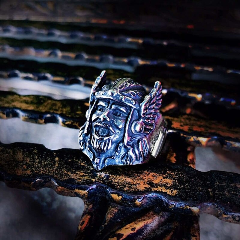 Viking-style stainless steel ring featuring Odin's head, perfect for a bold fashion statement.