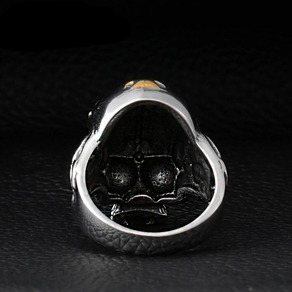 Detailed interior view of a stainless steel skull ring with intricate patterns and a unique design, perfect for rock style accessories.
