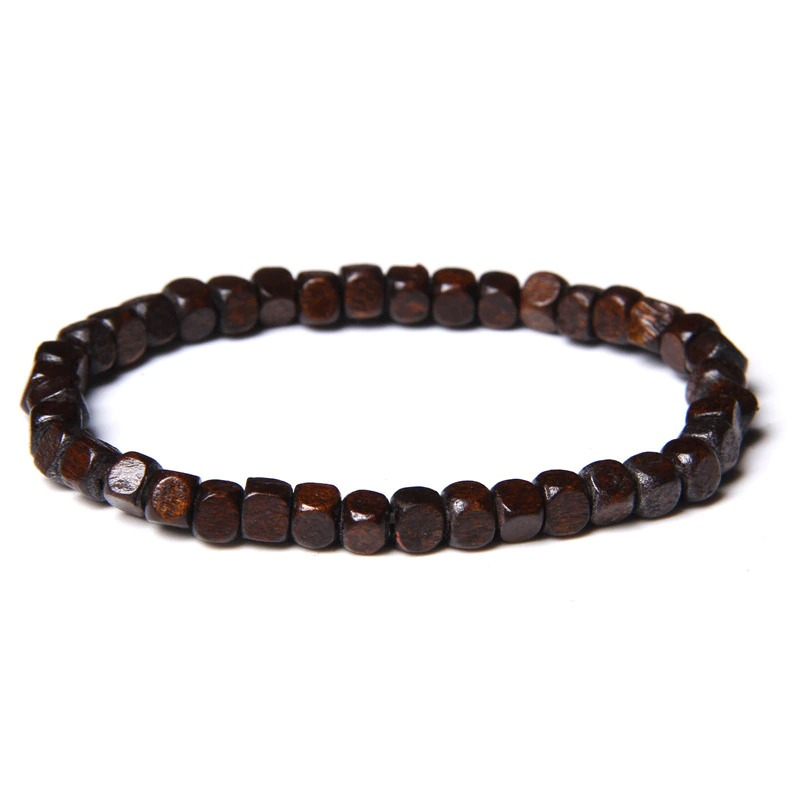 Unisex bracelet made of polished dark wood beads, perfect natural accessory for versatile fashion styles.
