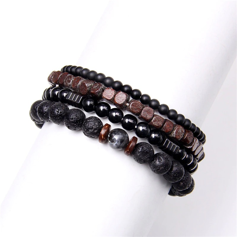 Set of unisex bracelets featuring natural stone and wood beads in black and brown tones, trendy accessory for any outfit.