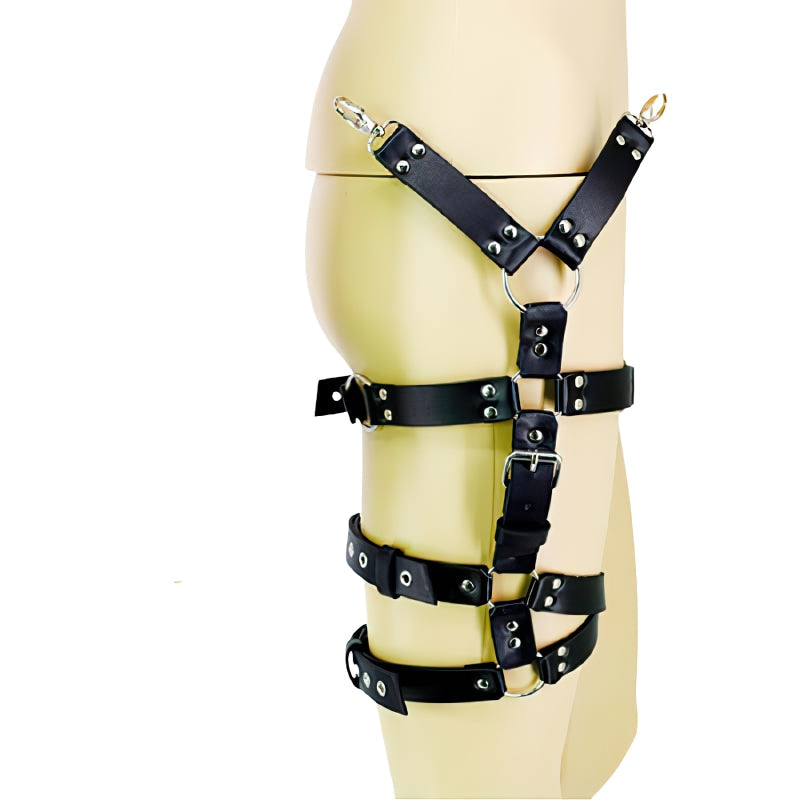 Stylish black leather body harness for women with metal rivets and rings, perfect for alternative and sexy outfits.