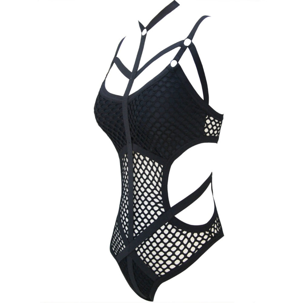 Sexy black net mesh one-piece swimsuit for women, featuring a stylish and revealing design perfect for beach outings.