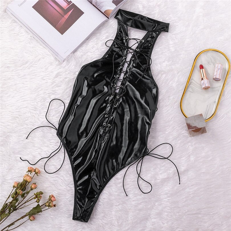Sexy shiny black vinyl lace-up bodysuit, perfect for gothic apparel and a bold fashion statement.