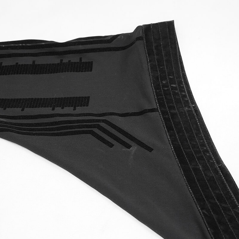 Close-up of the transparent fabric detail from a sexy black dress with futuristic print and trumpet sleeve.