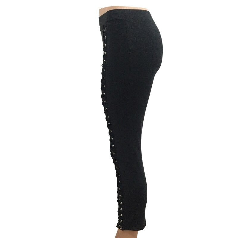 Sexy black lace-up leggings with holes, high waist and slim fit, perfect for club, gym, or street style.