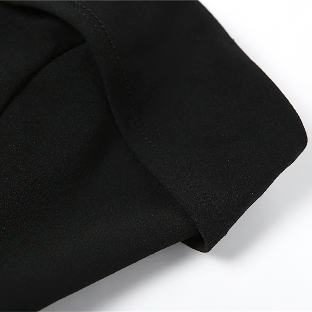 Close-up of the smooth fabric of a black women's asymmetrical dress, highlighting its stylish and casual design.