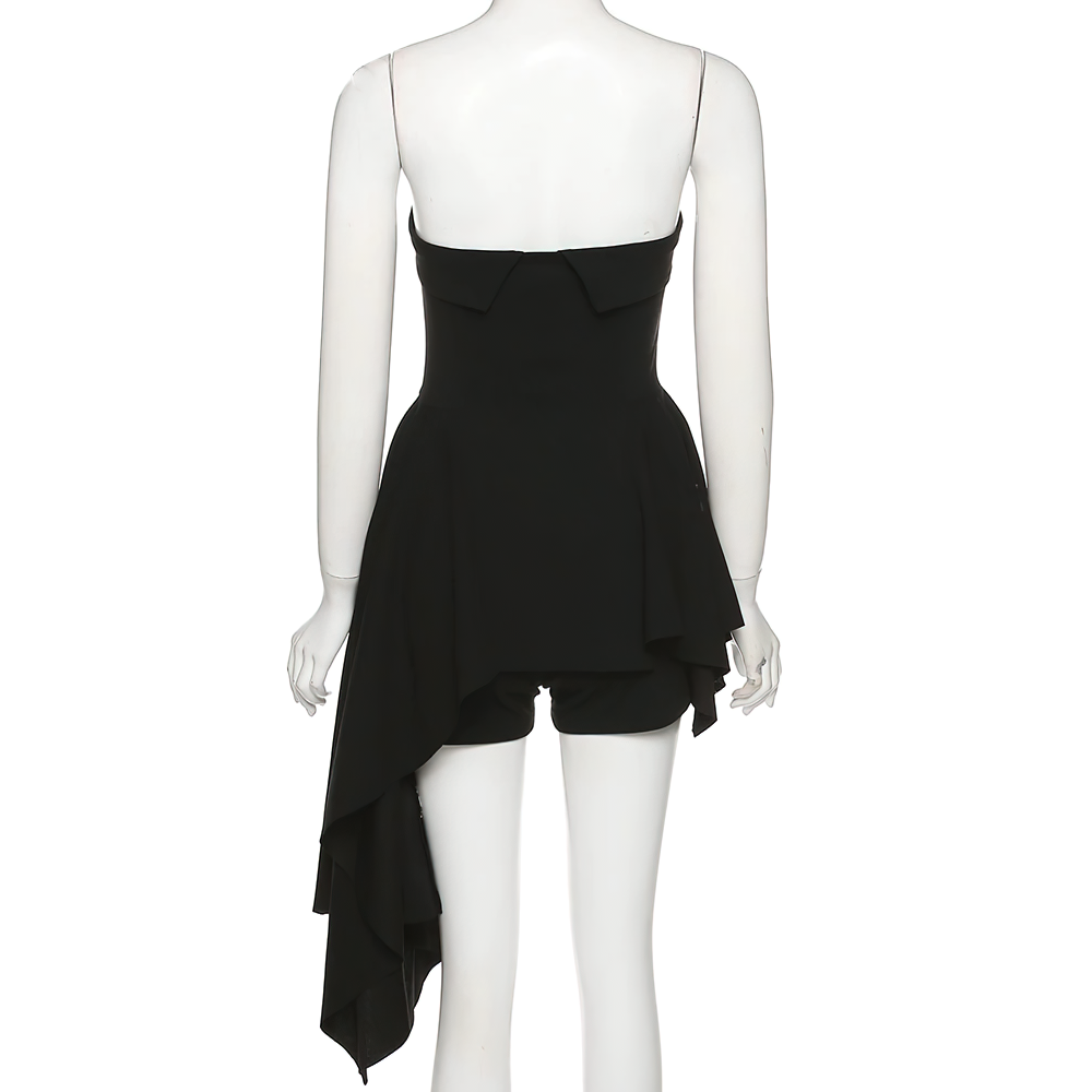 Back view of a sexy black women's asymmetrical strapless mini dress with shorts, showcasing its stylish design.