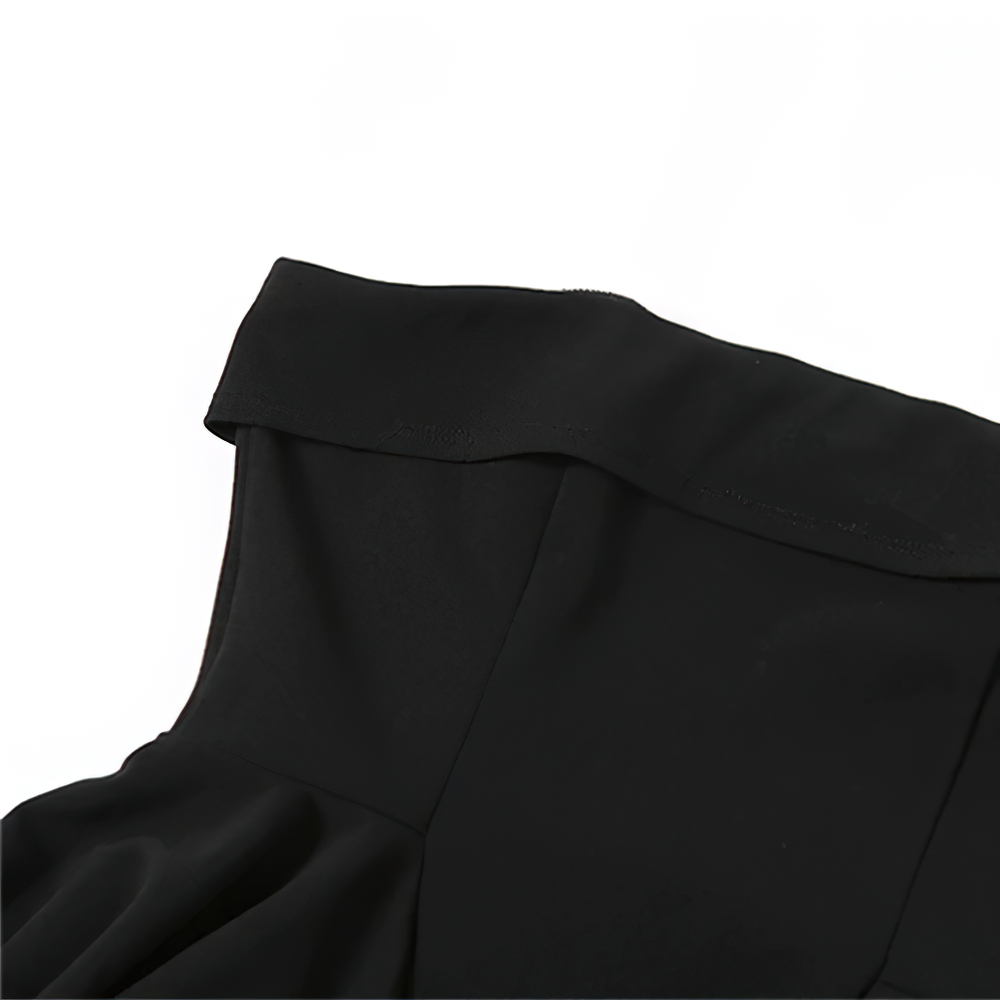 Close-up of the strapless neckline of a sexy black asymmetrical mini dress for women.