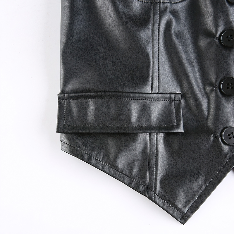 Close-up of a stylish black PU leather cropped vest showcasing button details and a pointed hemline.