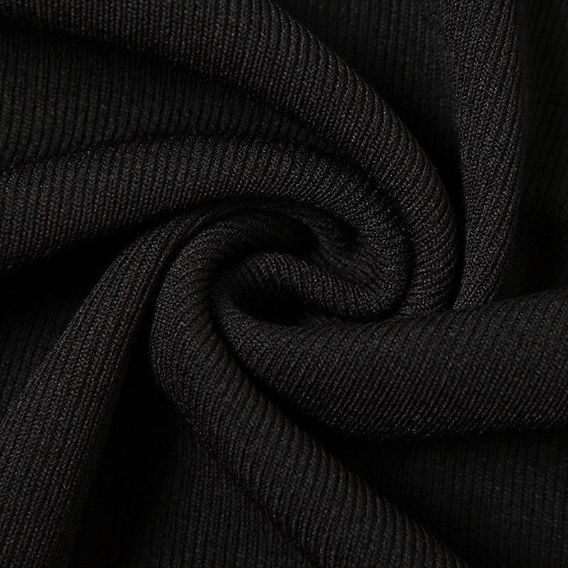 Close-up of soft black fabric showcasing smooth texture, perfect for a sexy bodycon dress.