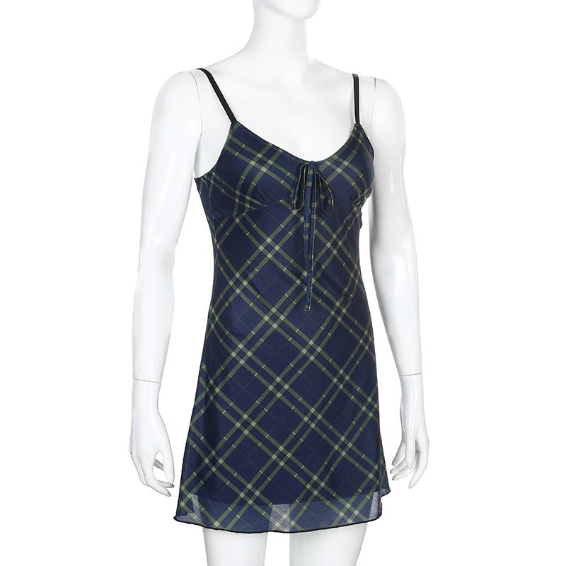 Sexy bow lace-up mini dress in grunge style featuring plaid pattern and adjustable straps.