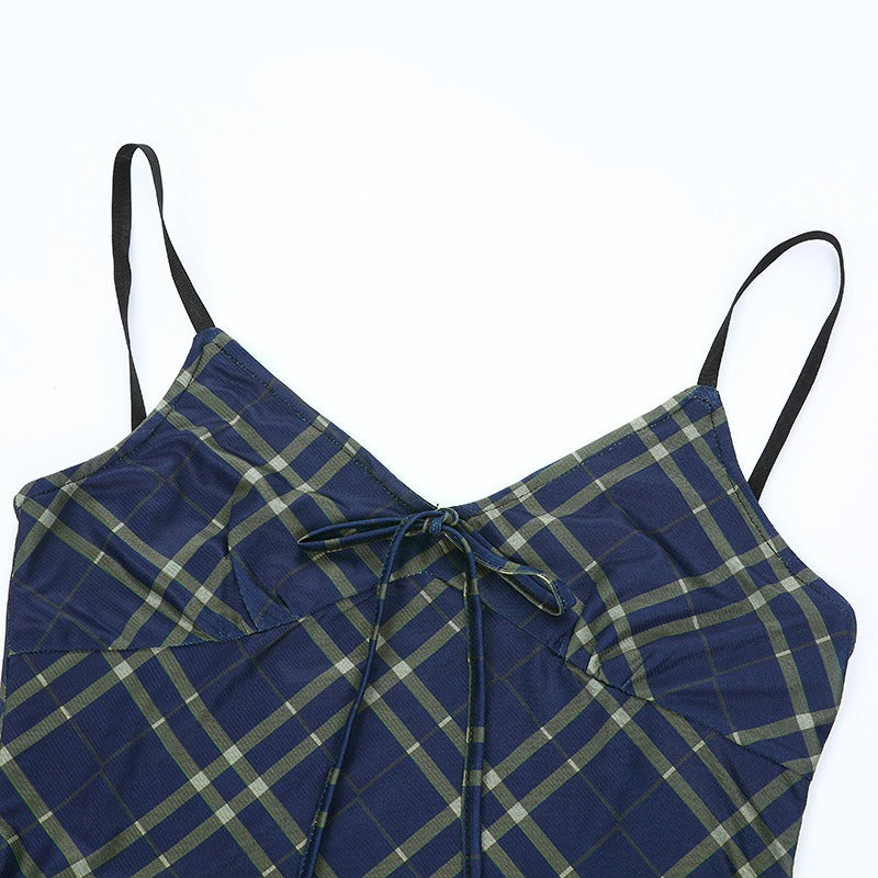 Sexy bow lace-up mini dress in grunge style with plaid pattern and spaghetti straps.