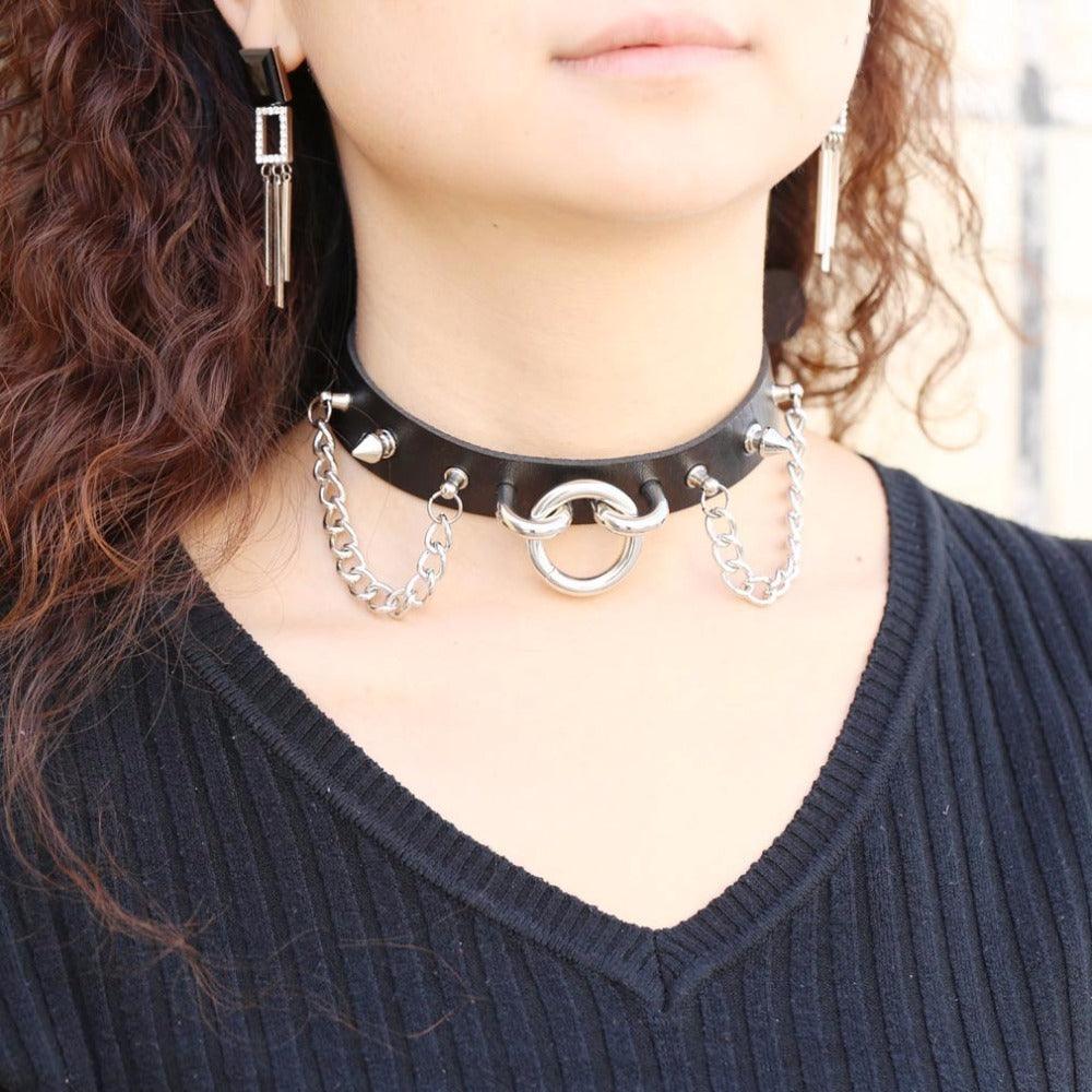 Stylish PU leather choker necklace with spikes and chains, perfect for gothic and rock star fashion looks.
