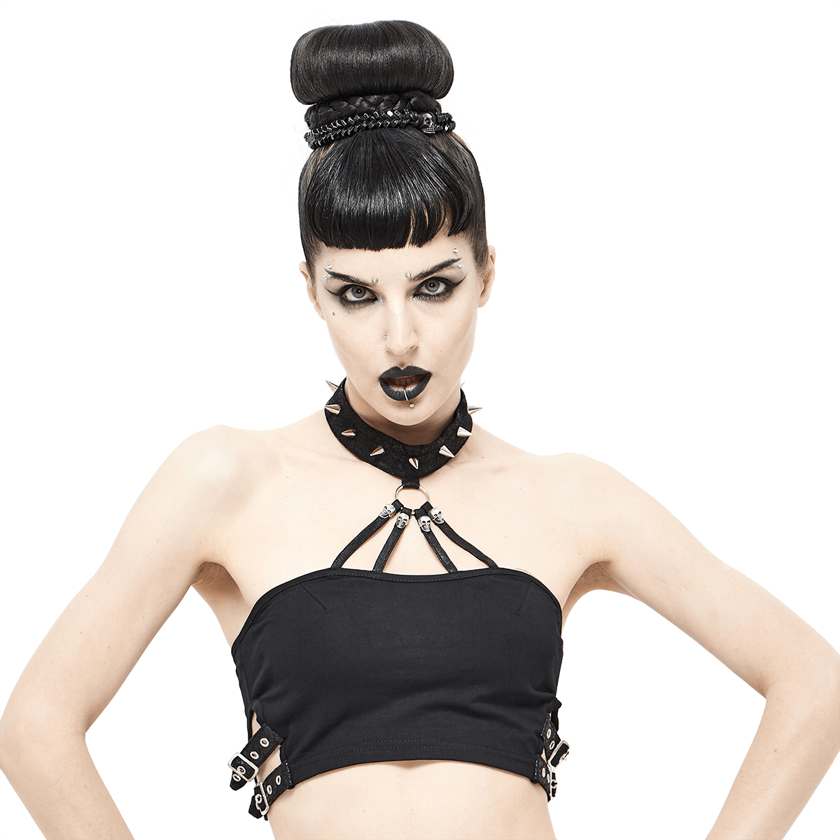 Gothic style black crop top with buckles and spikes, perfect for a bold female fashion statement.