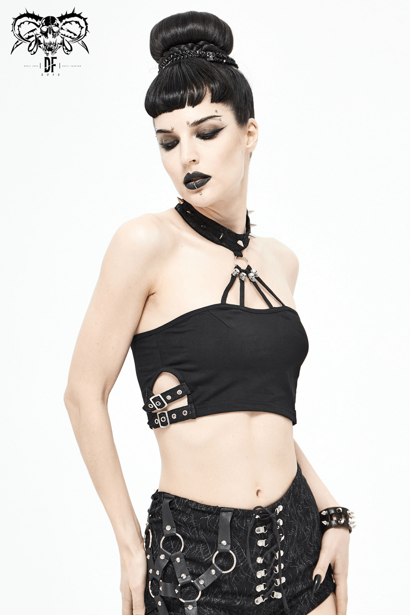 Gothic style black crop top with buckles and spikes, showcasing a trendy female fashion look.