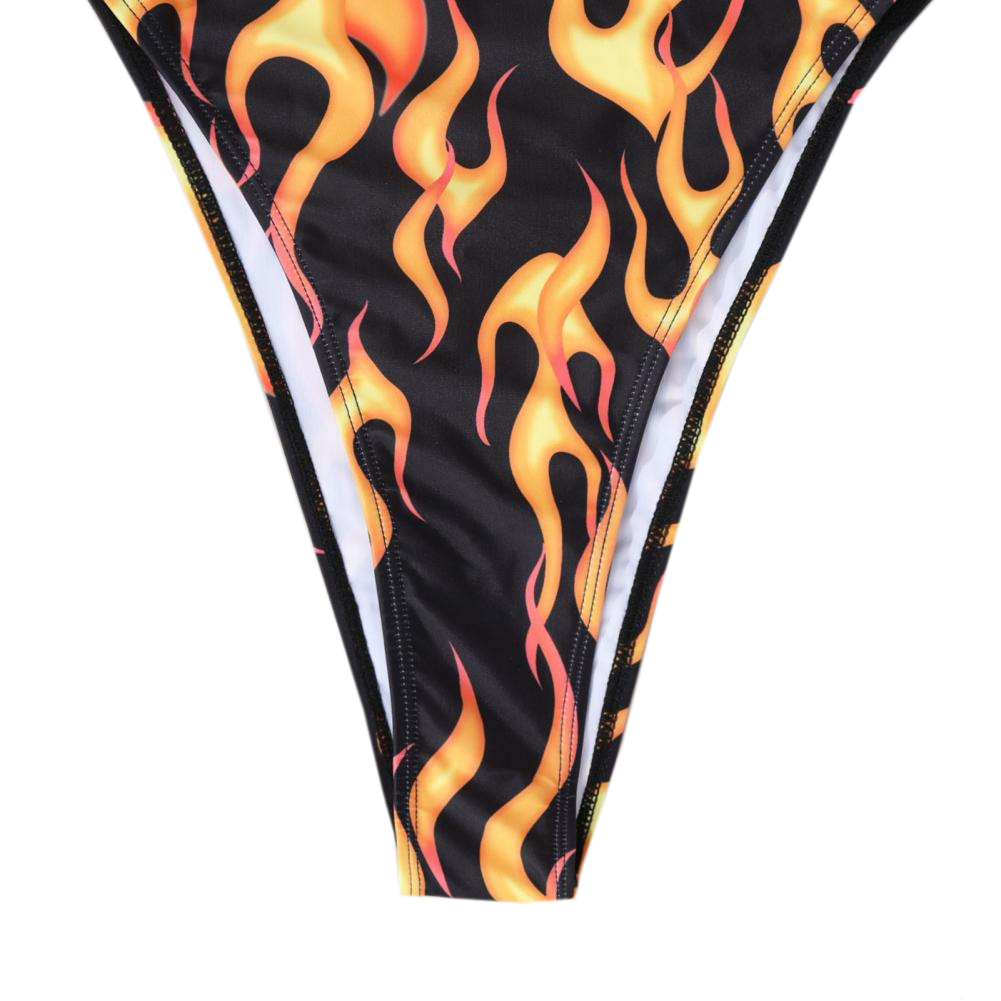 Sexy high cut black swimsuit with fiery orange flames pattern, perfect for a casual beach day.