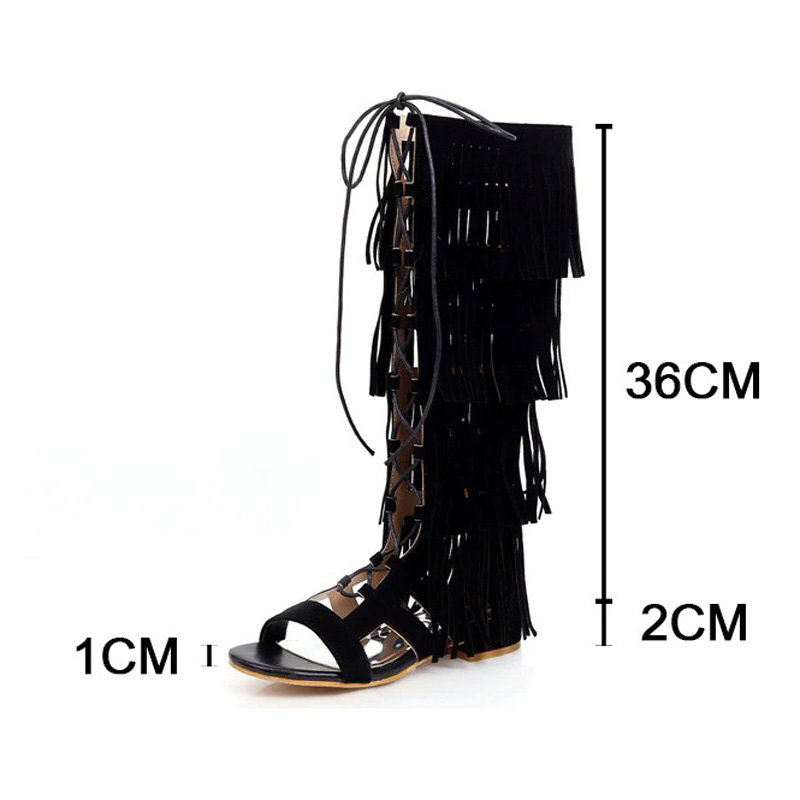 Stylish black gladiator sandals with fringes, featuring a low heel and open toe, perfect for festivals and cosplay.