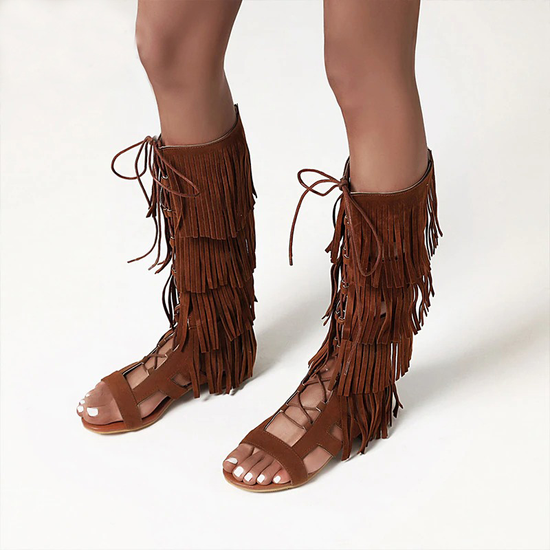Sexy gladiator sandals with fringe detail, perfect for festival looks and casual outfits.