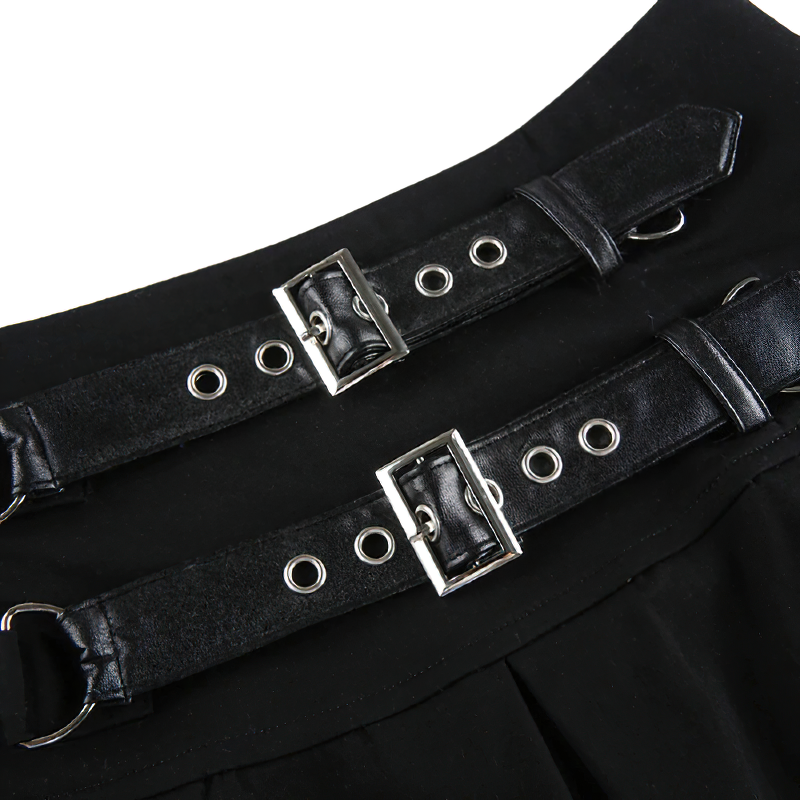 Close-up of buckles and rivets on a sexy gothic black mini skirt, adding edgy flair to fashion outfits.