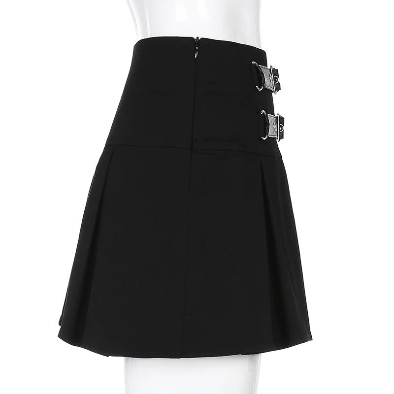 Women's sexy gothic black mini skirt with pleats and stylish rivets, perfect for a rock-inspired outfit.