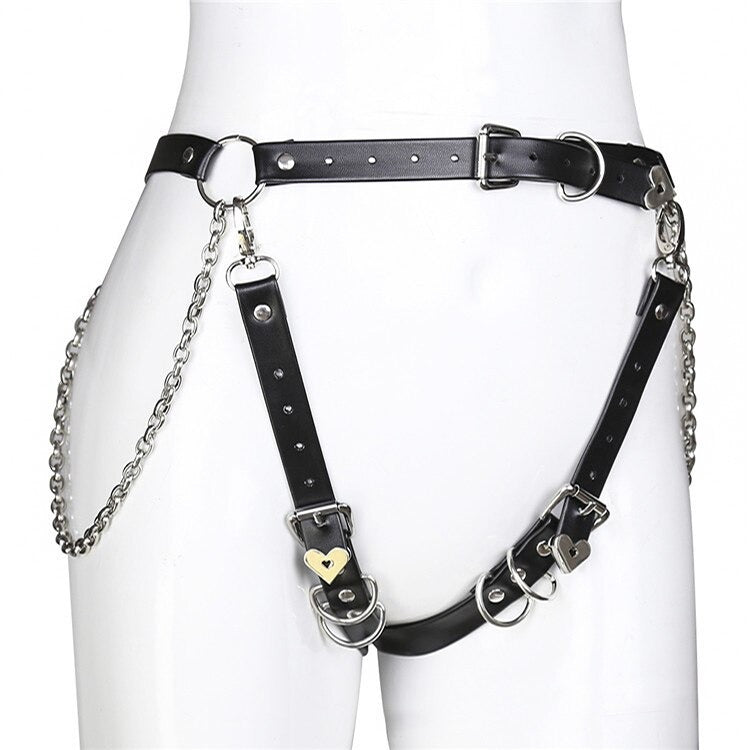 Sexy gothic body harness with chains and leather straps for women, perfect for pastel goth fashion.