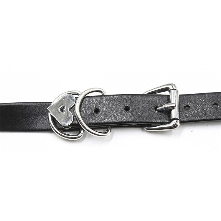Black synthetic leather belt with heart-shaped buckle, perfect for gothic and pastel goth fashion.