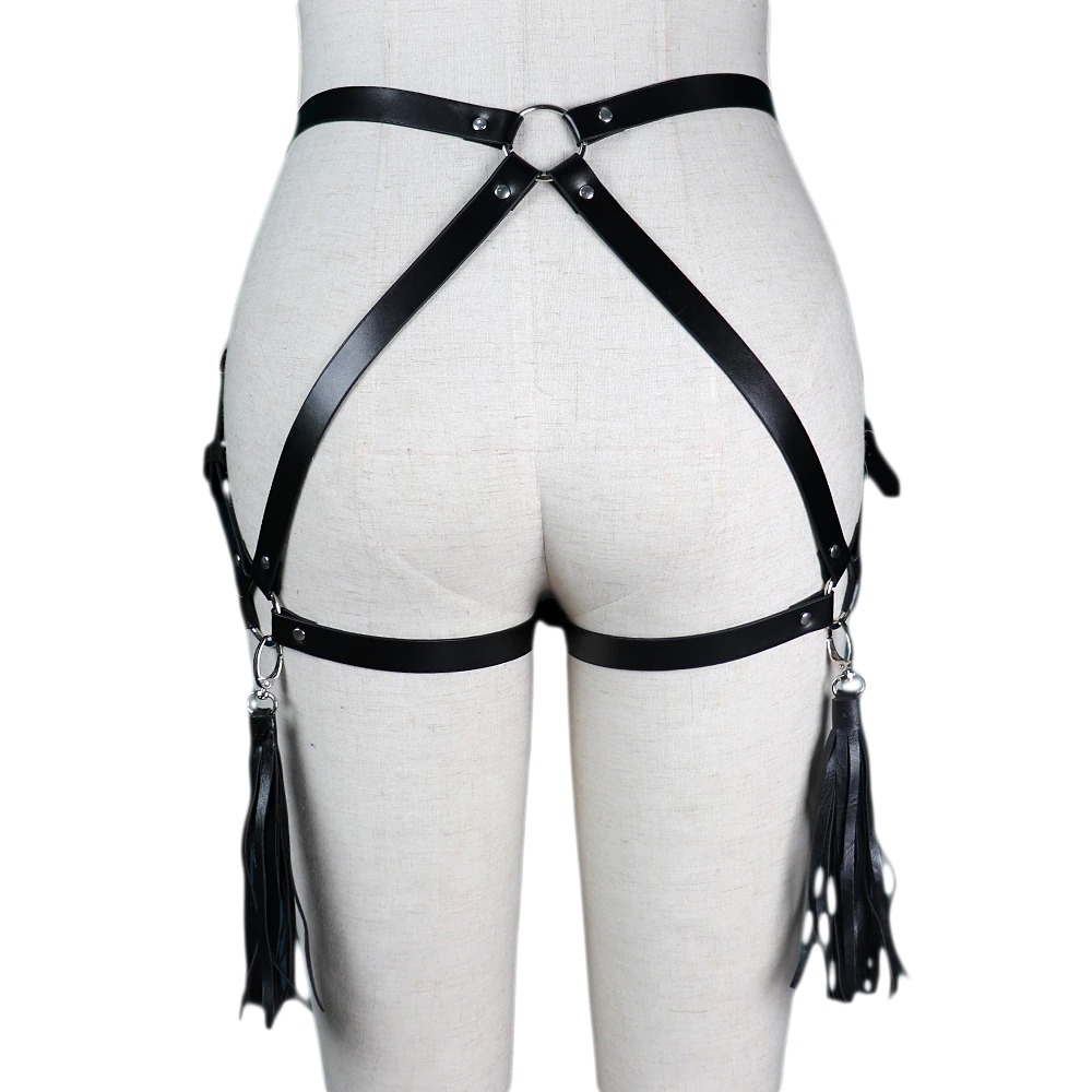Gothic women's harness made of leather with silver fittings and tassels, perfect for adding an edgy touch to any outfit.