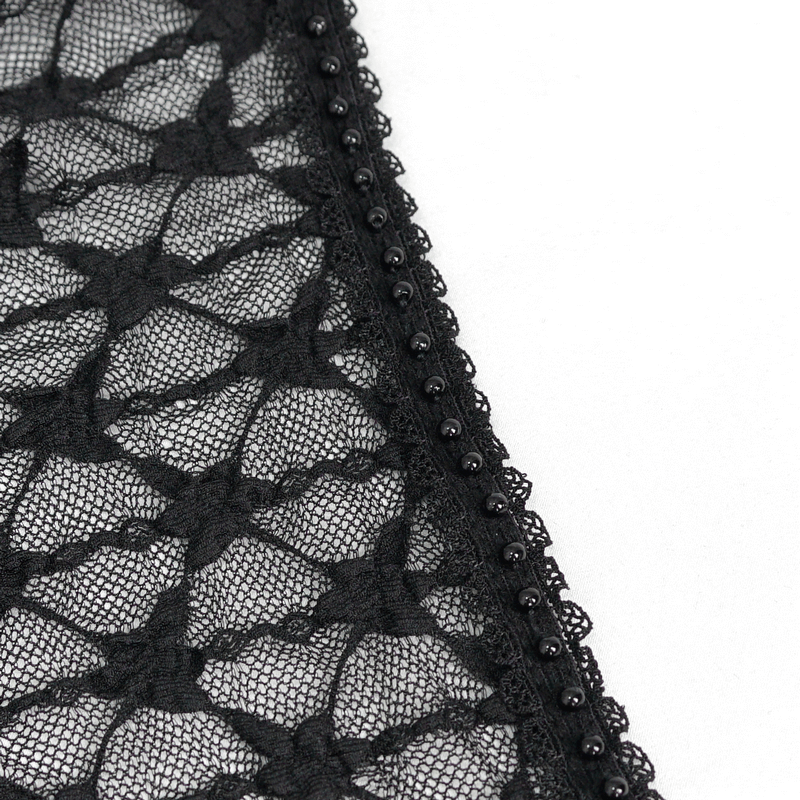 Close-up of intricate black lace fabric with stylish bead detailing for a gothic chic look.