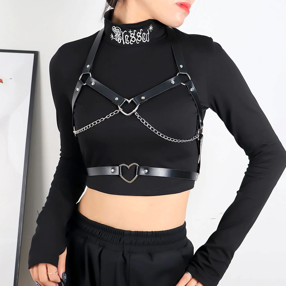 Gothic suspender belt bra with chains and heart connector, perfect for edgy outfits and bondage style.