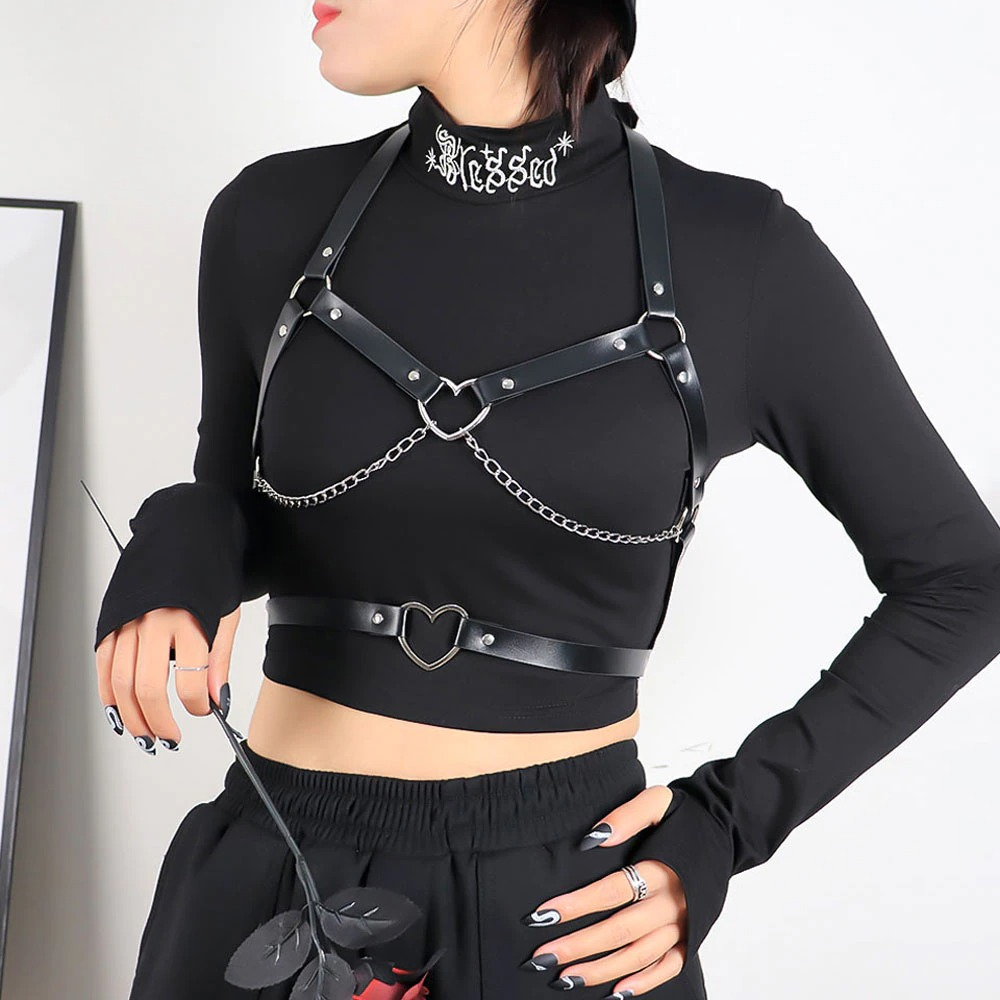 Sexy gothic suspender belt bra with chains and heart-shaped connectors for a trendy bondage look.