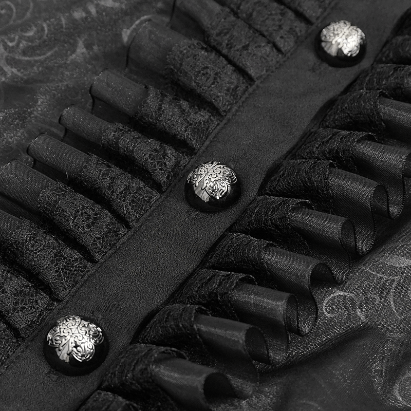 Close-up of elegant black ruffled fabric with ornate buttons, showcasing gothic style and chic design details.