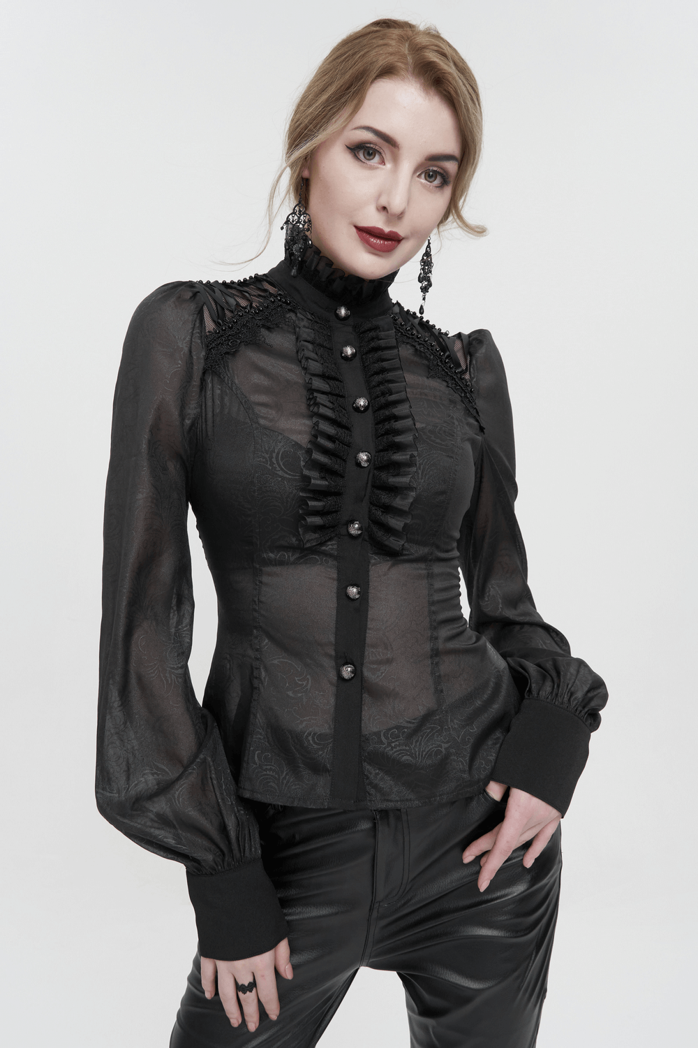 Elegant women's black gothic blouse with long sleeves, ruffled details, and a strappy stand collar; perfect for stylish outfits.