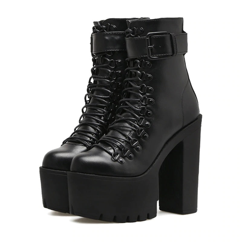 Stylish black platform ankle boots with laces, buckle, and high square heel for rocker outfits.