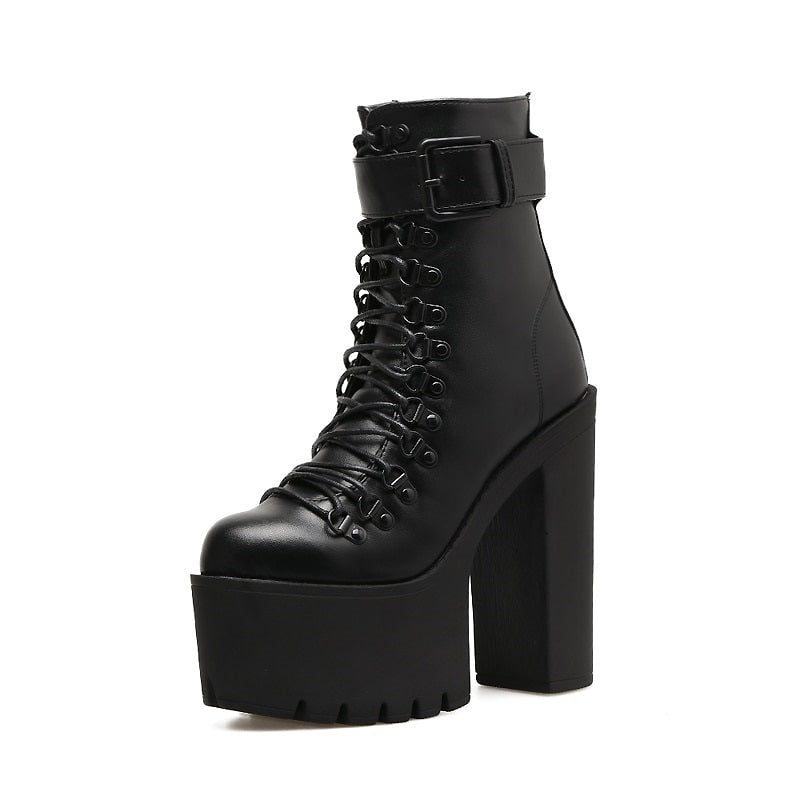 Stylish black laced platform ankle boots with high block heel and buckle for rocker outfits.