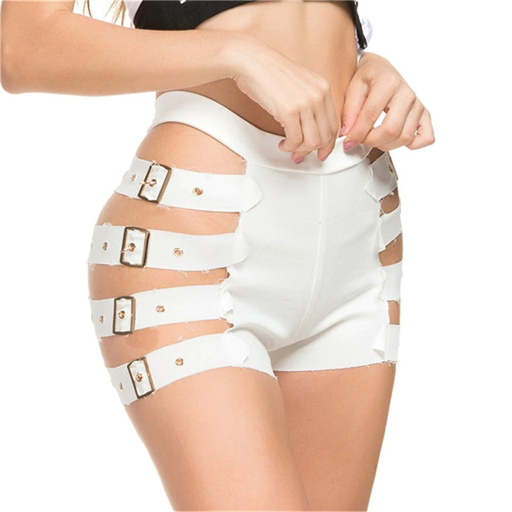 Model wearing high waist ripped white denim shorts with buckles and cutouts for a trendy summer look.
