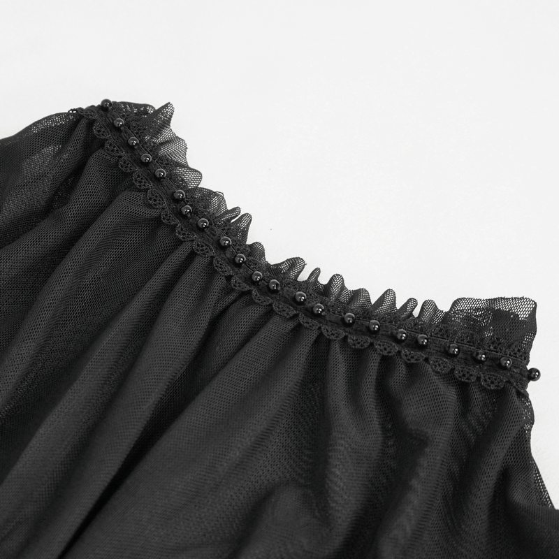 Close-up of black lace ruffle sleeves with bead detailing, ideal for gothic fashion enthusiasts.