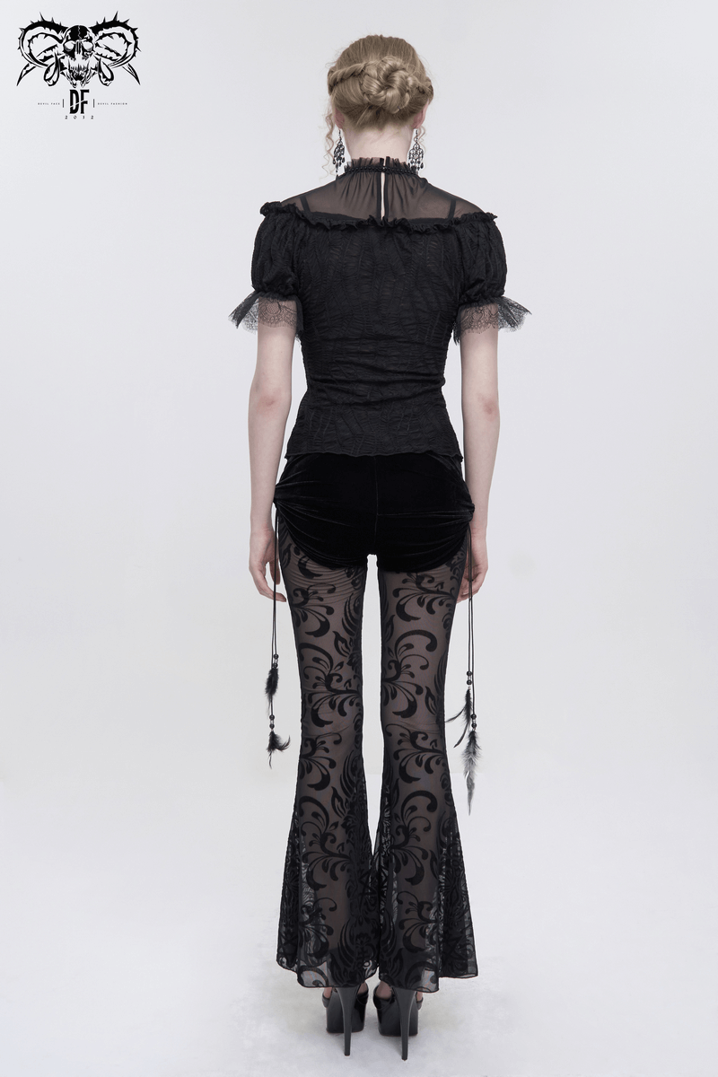 Stylish black gothic t-shirt with lace ruffle sleeves and skinny pants, showcasing a chic back view.