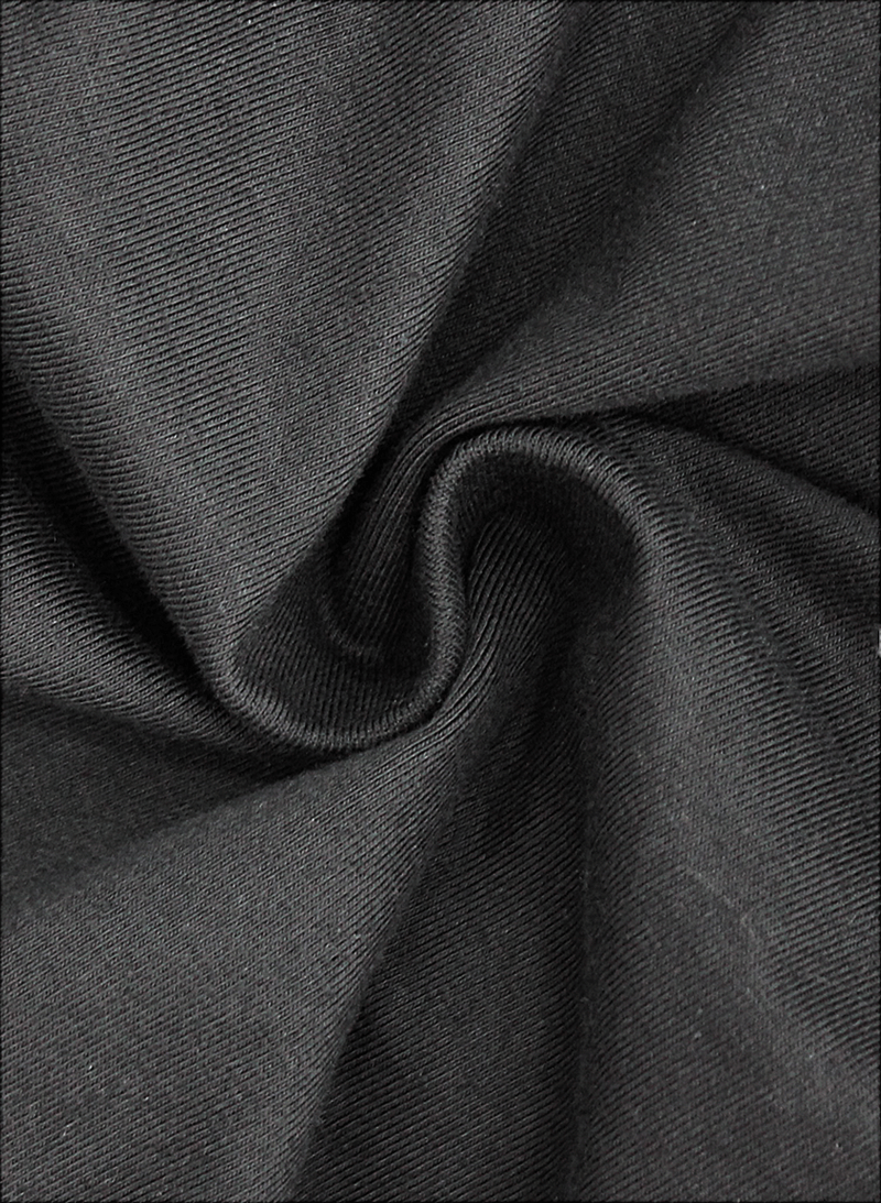 Close-up of black fabric showcasing its texture, perfect for a stylish women's gothic jumpsuit.