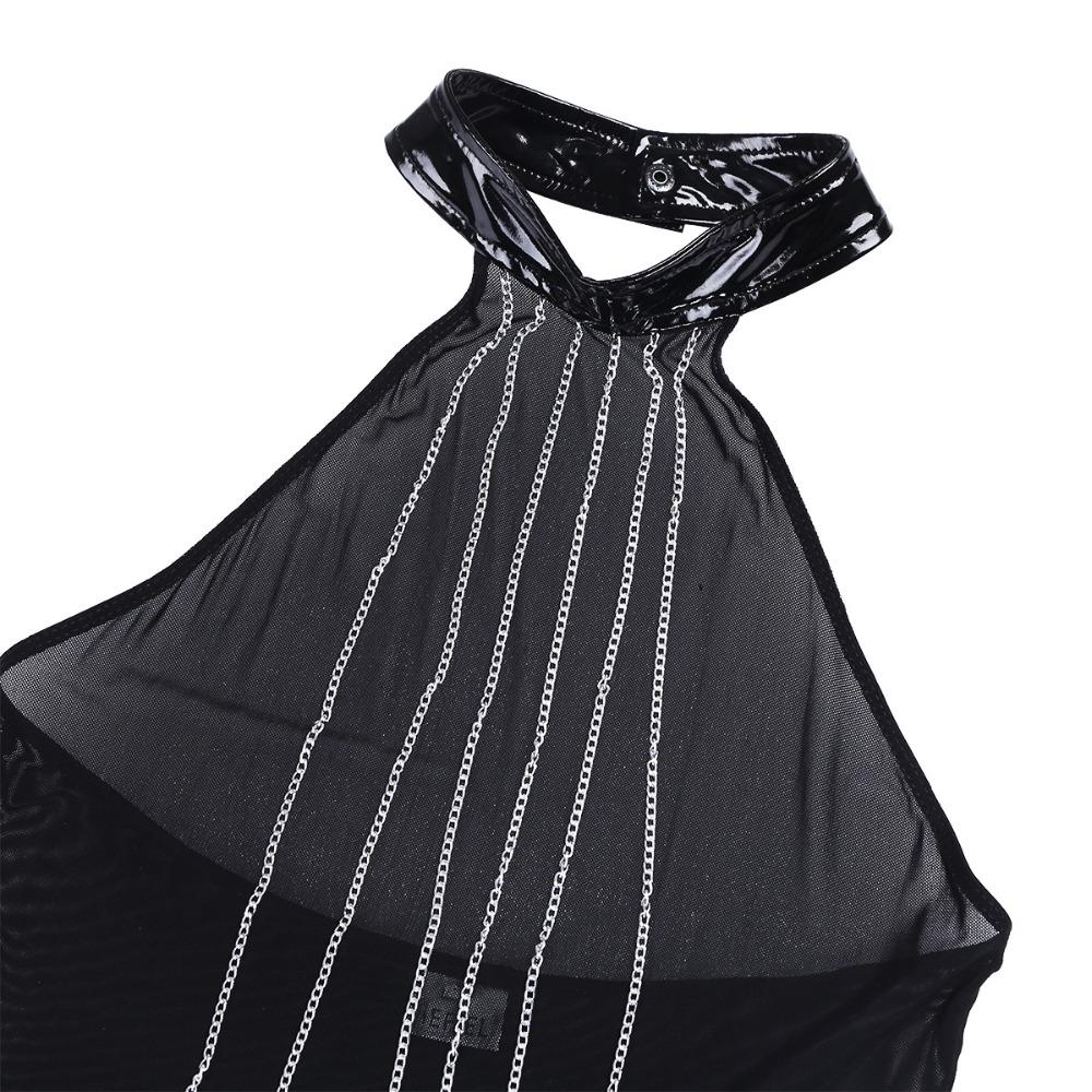 Close-up of a sexy sleeveless gothic dress with silver chains, featuring a halter neckline and sheer mesh design for rave outfits.
