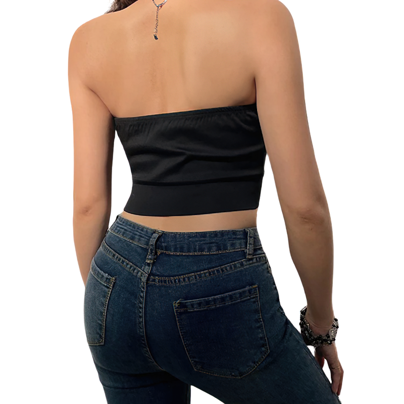 Back view of a women's black sleeveless crop top paired with high-waisted jeans, highlighting trendy streetwear style.