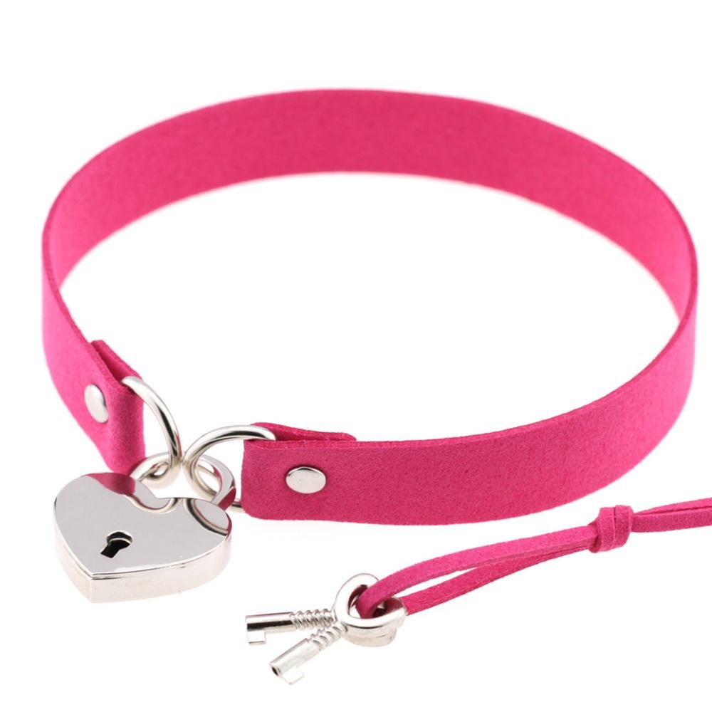 Pink steampunk heart choker collar with lock and key, perfect for alternative fashion lovers.