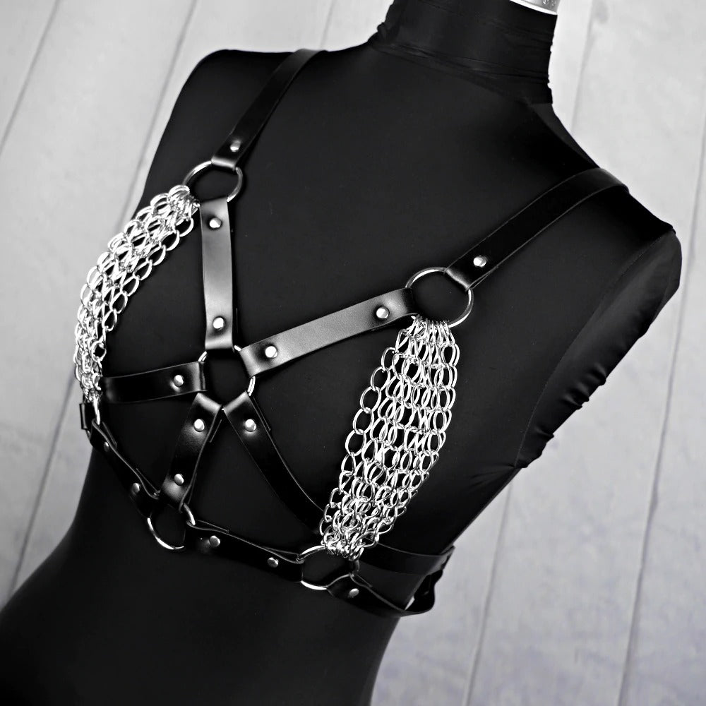 Sexy women PU leather bra harness with chain detailing for rave outfits and bondage style.