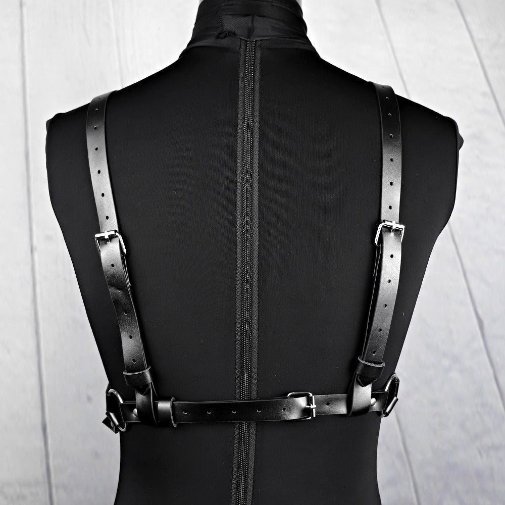 Back view of a sexy women PU leather bra harness with adjustable straps, perfect for rave outfits and body bondage wear.
