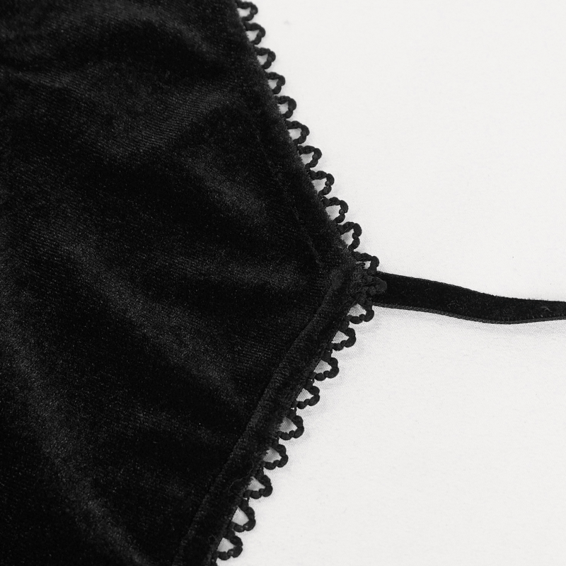 Close-up of luxurious black velvet fabric with delicate lace trim, perfect for a gothic lace bodysuit.