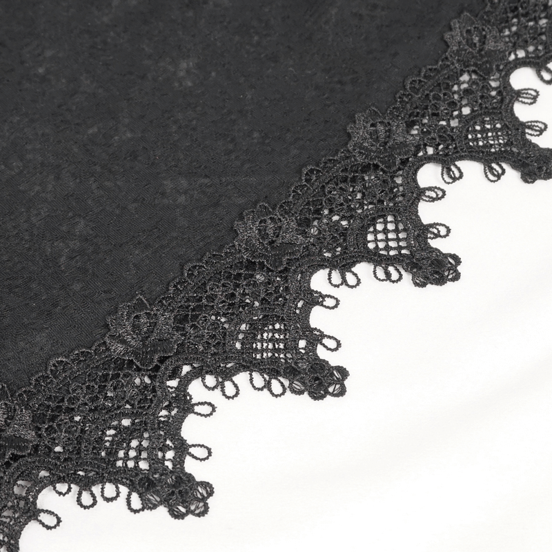 Close-up of intricate black lace detailing, perfect for gothic fashion and elegant dress design.