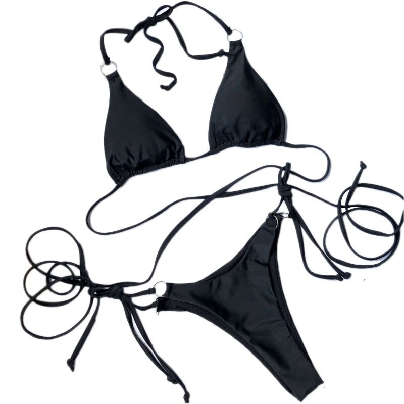 Sexy black bikini set with triangular top and tie-side bottom, perfect for summer beach adventures.