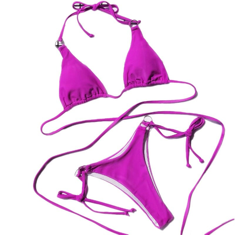 Sexy pink women's bikini set with adjustable ties for a trendy summer look.