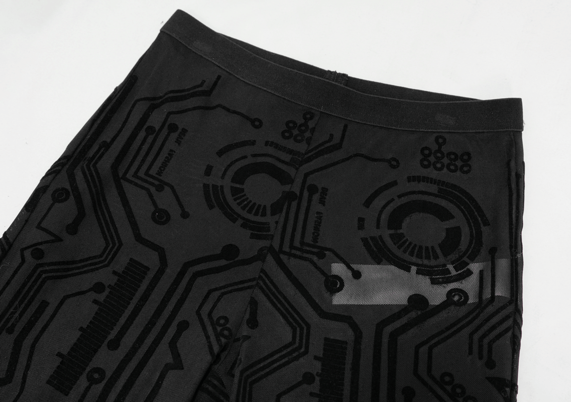 Close-up of women's black cyberpunk leggings featuring a stylish circuit pattern. Perfect for a futuristic wardrobe.
