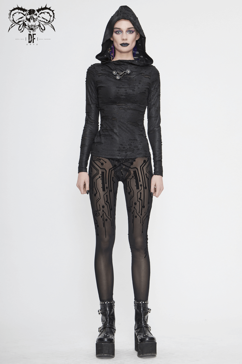 Woman in black cyberpunk hooded top and see-through leggings, showcasing edgy fashion style with platform boots.
