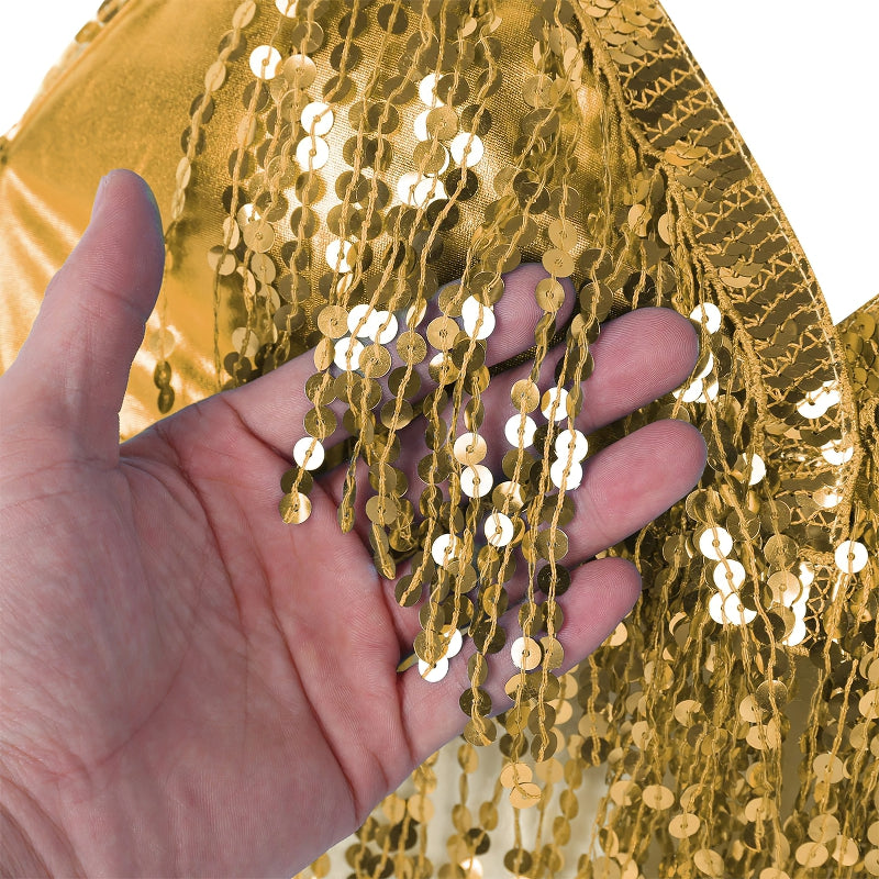 Shiny gold bra top with sequins, hand showcasing the dazzling details and fringe design, perfect for dance or night out.